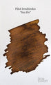 Iroshizuku Ink - Ina Ho (50ml) shown with a rice-ear brown swatch and fine pen strokes, featuring The Desk Bandit watermark in bottom right corner.