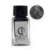 Jade Grievance - 18ml: A small glass bottle with black shimmering ink, featuring Chinese calligraphy and a river scene illustration on the label.