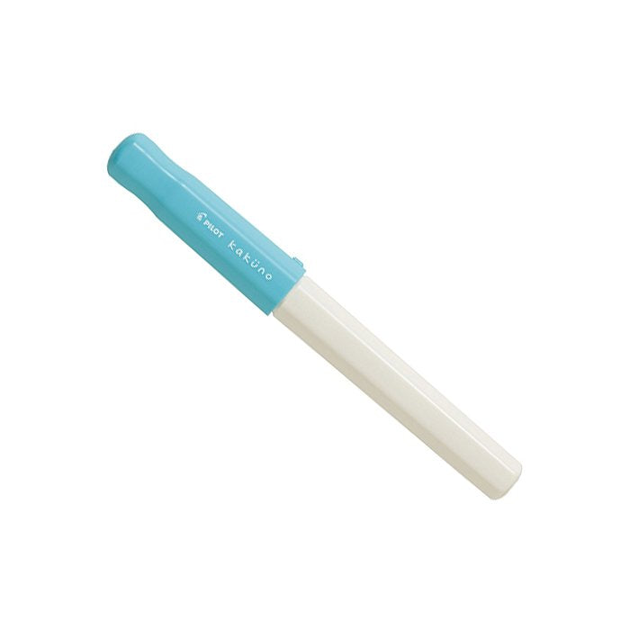 Pilot Kakuno fountain pen with a light-blue cap and white barrel, featuring a medium stainless steel nib, ideal for beginners. Includes a black ink cartridge.