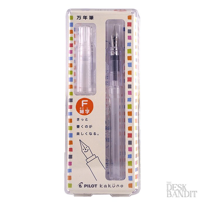 Pilot Kakuno - Clear - Fine fountain pen set in clear packaging, showcasing a transparent pen with a fine nib, and an ink cartridge/converter included.