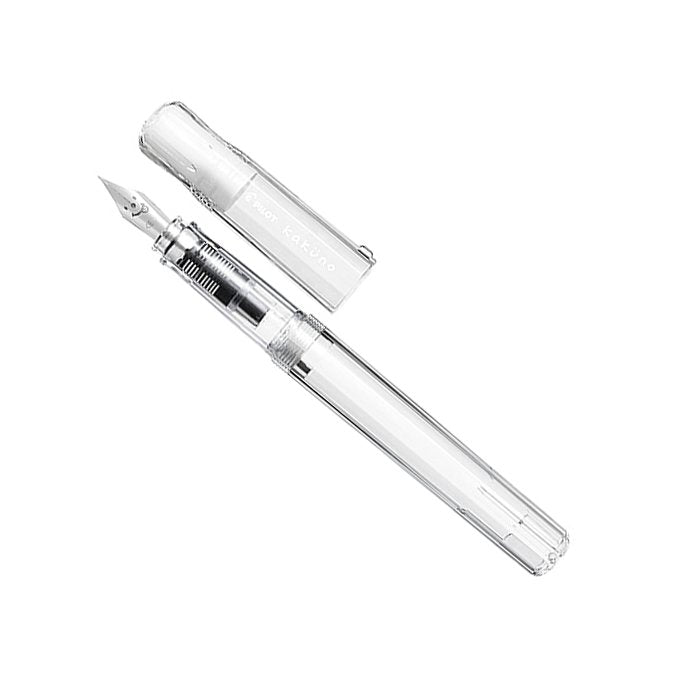 Kakuno - Clear - Extra Fine fountain pen, transparent design showcasing clear barrel, ink feed, converter, and exposed steel nib, cap removed for detailed view.