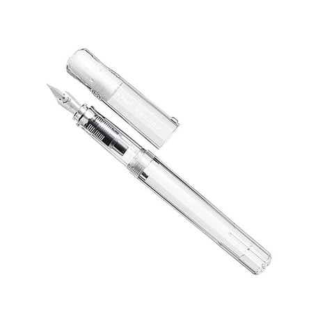 Kakuno - Clear - Medium fountain pen features a transparent design with a visible stainless steel nib and branded cap, perfect for beginners.