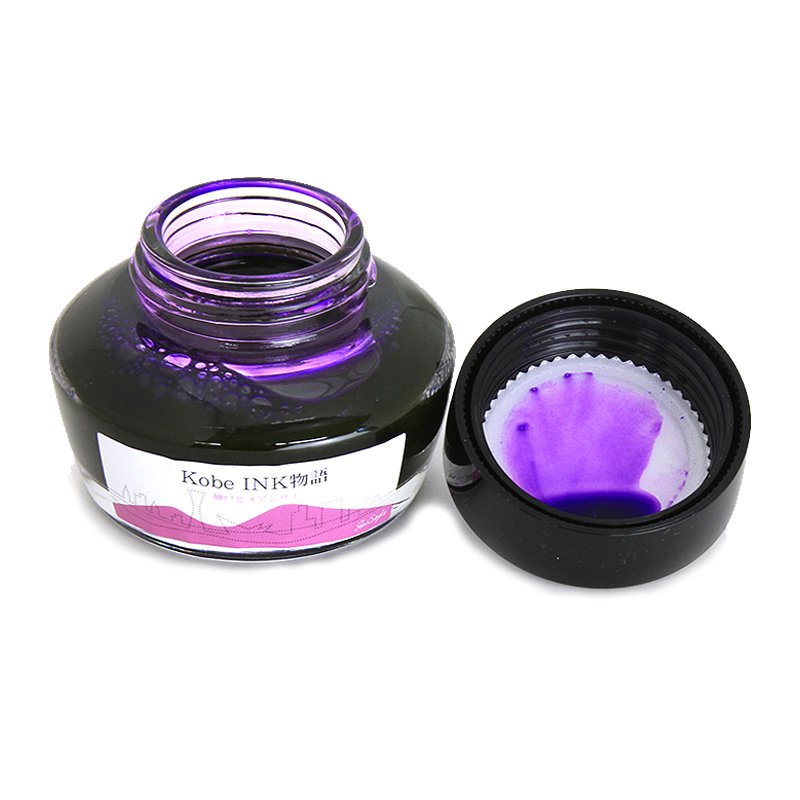 No.57 Kobe Hydrangea - 50ml fountain-pen ink in a squat glass bottle, cap removed. Vivid purple ink smudges visible on the cap&