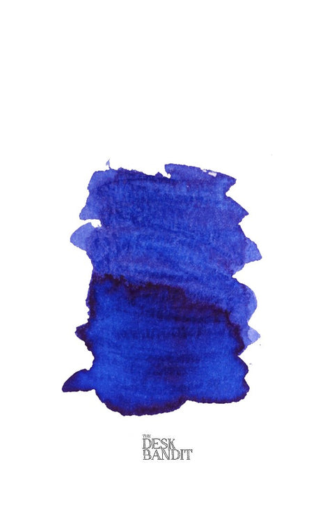 Konigsblau (2ml) dye-based ink swatch from Rohrer & Klingner, featuring a deep blue brush-stroke on a white background with THE DESK BANDIT logo below.