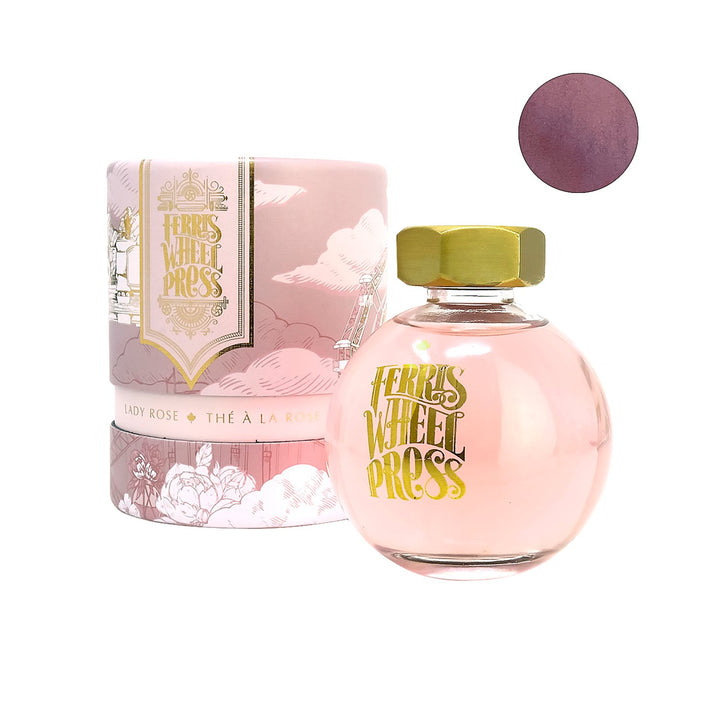 Lady Rose - 2ml ink sample in a round glass bottle with a gold-tone cap, alongside pink-and-gold packaging and a rosy-pink swatch.