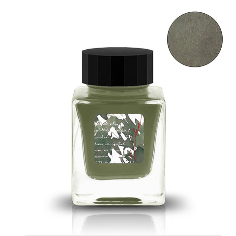 Square glass bottle with black cap, containing Laika - 2ml olive-green ink sample by Tono & Lims, ideal for fountain pen enthusiasts.