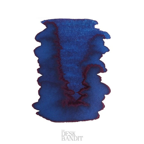 Lake of Fire - 2ml ink sample, dark blue with purplish-red sheen, on white paper bearing THE DESK BANDIT watermark.