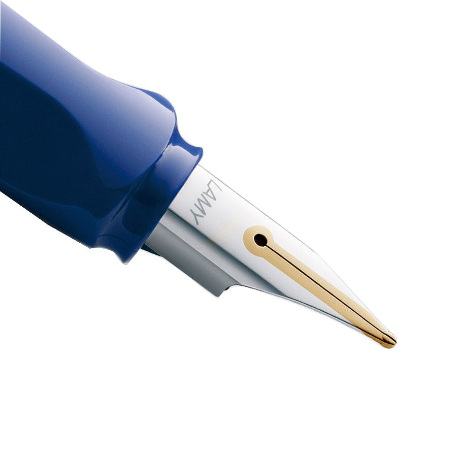 Inlaid 14k Nib - Oblique Broad: Close-up of Lamy fountain pen's two-tone nib with gold trim, set in blue plastic grip, showcasing breather hole and metal feed.