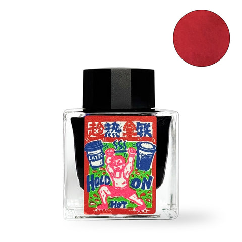 Latte, While It's Hot - 2ml fountain pen ink by Fanyantan and Flows12, featuring a vibrant label with a cartoon character holding coffee cups.