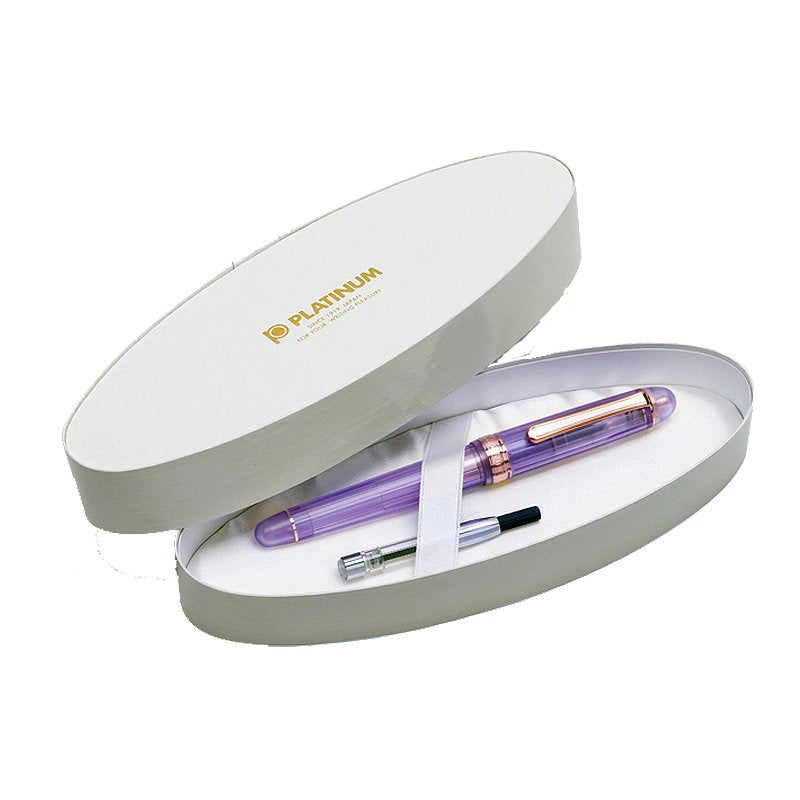 #3776 Century Nice Lavande - Medium fountain pen in a branded gift box with a translucent purple body, white fabric strap, and included ink converter/cartridge.