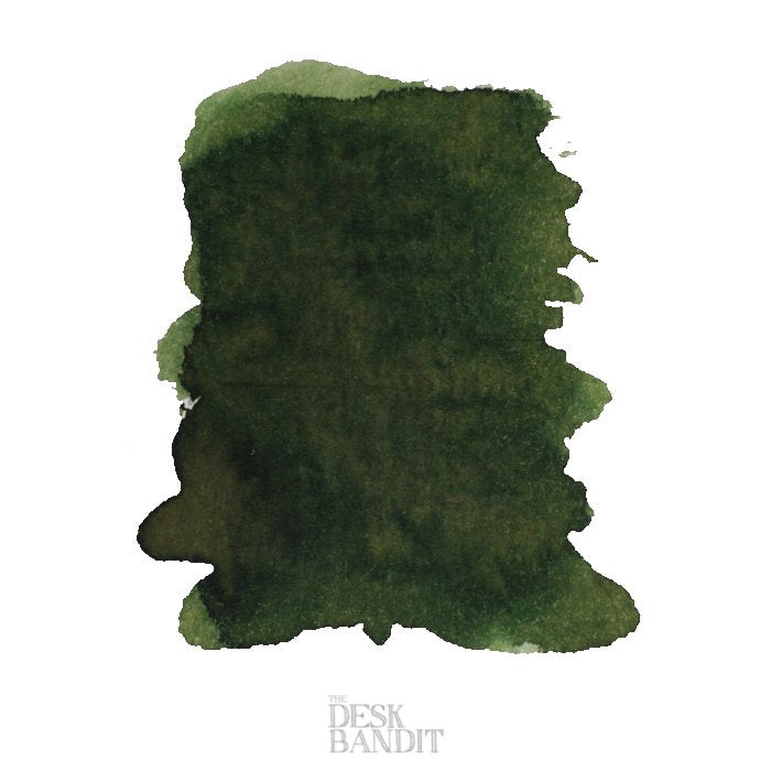 A deep olive-green ink blot labeled The Desk Bandit, representing Robert Oster's Lemon Grass - 50ml dye-based fountain pen ink.