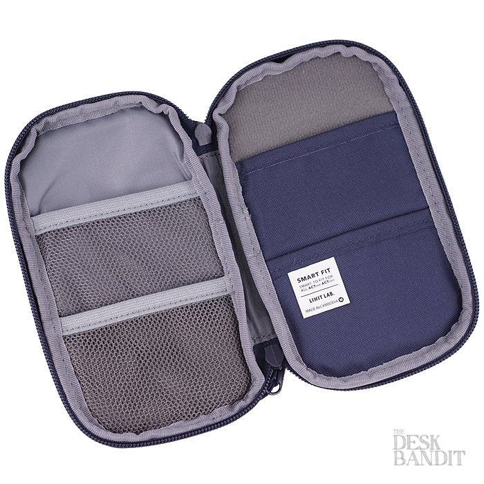 Smart Fit Compact Pen Case (Navy) with mesh pockets and card sleeves, featuring a zip-around design for organizing cables, pens, and small accessories.