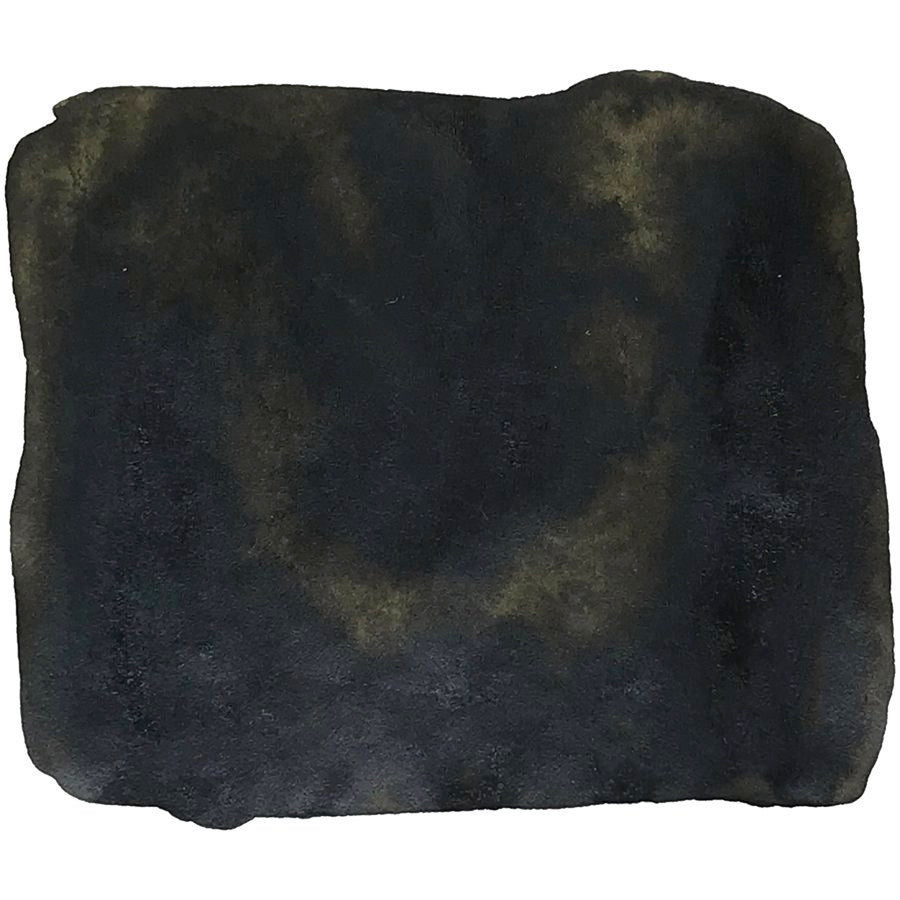 SketchINK - Lilly (2ml) displayed on a soft, black-charcoal microfiber pad, highlighting its compact size and suitability for fountain pen use.