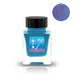 LUC Spring Dreams 春の夢 - 30ml: A clear glass jar of turquoise-blue fountain-pen ink with a purple sheen, featuring a quill icon and Japanese lettering.