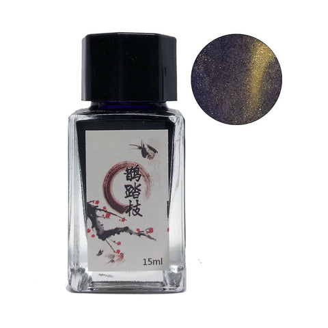 Magpie On A Branch - 18ml: A small glass bottle of shimmering ink with a plum blossom label, featuring deep purple ink with gold shimmer.