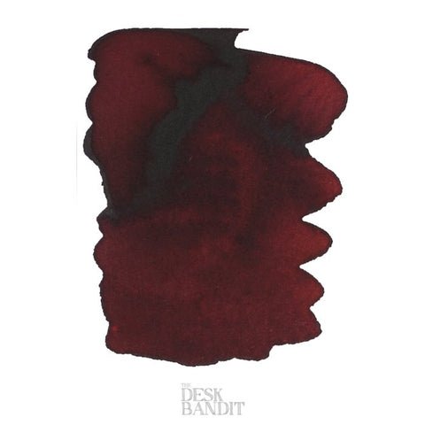 Maroon 1789 - 2ml ink sample by Robert Oster, showcasing a rich burgundy tone with darker pigment pools, labeled THE DESK BANDIT watermark.