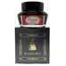 Bungubox's Matador Red ink bottle atop its branded black and gold packaging, showcasing the 2ml dye-based fountain pen ink.