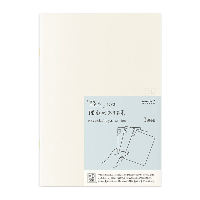 MD Notebook Lite - A5 Grid (3 pack) featuring ivory covers, Japanese text band, and index stickers. Each notebook has 48 pages with 5mm grid spacing.