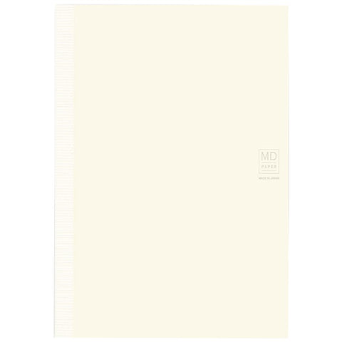 Midori MD Notebook A5 Lined with cream-colored cover, visible binding strip, and “MD PAPER – MADE IN JAPAN” logo on the lower right corner.
