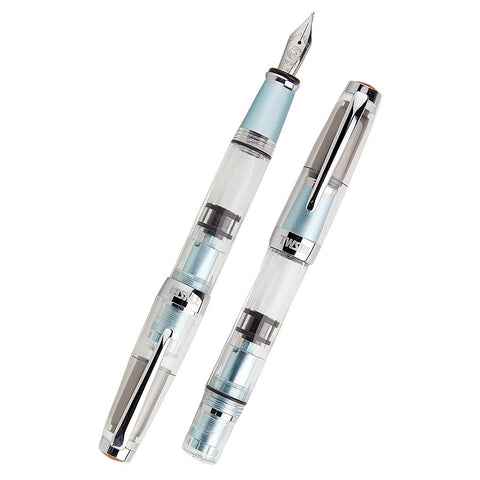 Diamond Mini AL (Mint) - Extra Fine fountain pens with clear barrels, silver-tone accents. One capped, one uncapped showing steel nib, pale blue grip and end caps.