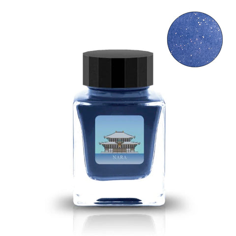 Nara (Shimmer) - 30ml square-glass bottle of dark blue ink with glitter, featuring a Japanese temple label and close-up of shimmering particles.