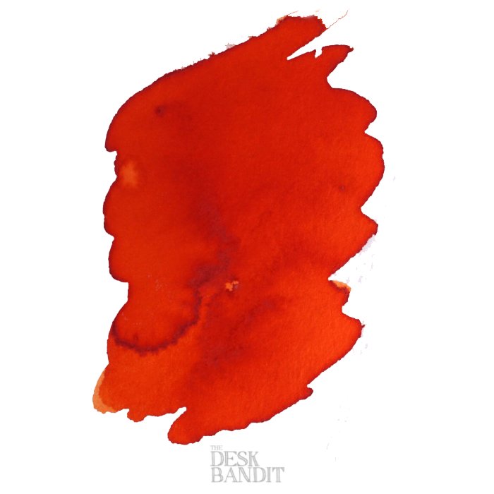 Orange Zest - 2ml ink sample by Robert Oster, featuring a bright red-orange brushstroke with varied pigment density on a textured white background.