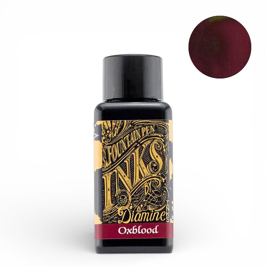 Diamine Oxblood - 30ml fountain pen ink in a small glass bottle with a label highlighting its rich, smooth-flowing formula, ideal for writing enthusiasts.