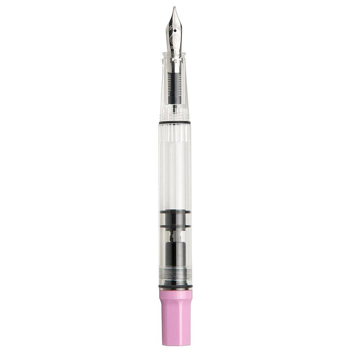 ECO (Pastel Pink) - Extra Fine fountain pen with transparent barrel revealing piston fill mechanism, silver nib, and pink blind cap.