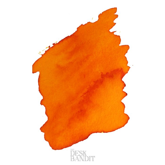 Abstract orange swatch on white paper, showcasing Robert Oster's Peach - 2ml ink sample. Features dye-based ink, capturing the vibrant essence of the color.