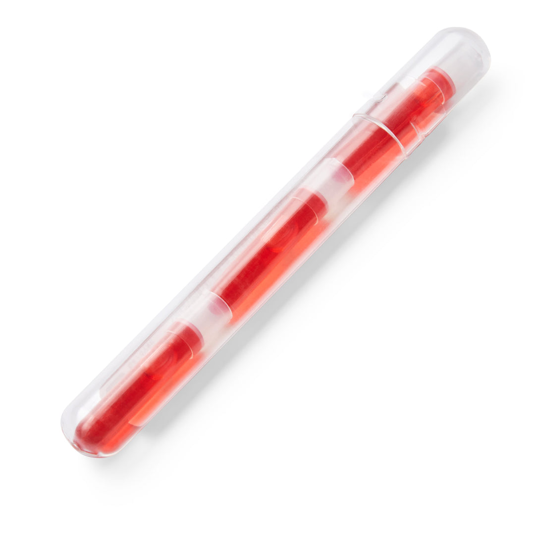 Clear plastic tube with two red cylindrical sticks, resembling Petit Ink Cartridges - Pink, compatible with Pilot Petit pens for extended use.