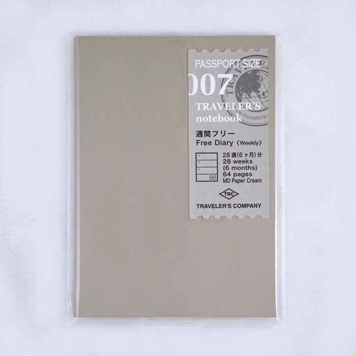 Traveler's Company #007 Undated Weekly (Passport) refill insert, sealed, featuring 64 cream pages for 28 weeks, designed for Traveler’s Notebook.