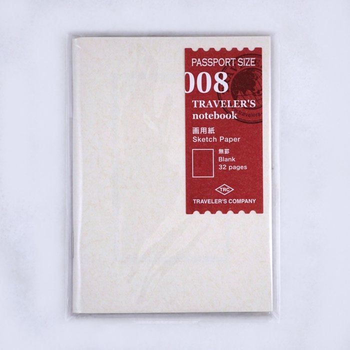 #008 Sketch Paper (Passport) by Traveler's Company, 32-page blank refill booklet with white MD Paper, wrapped in clear plastic sleeve, suitable for leather covers.
