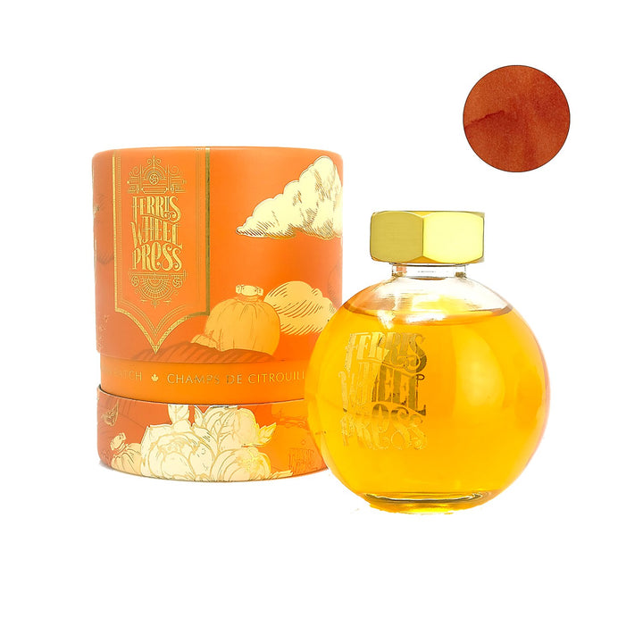 Pumpkin Patch - 85ml ink set: a clear glass bottle with gold cap, orange ink, luxurious presentation box with pumpkin design, and color swatch.
