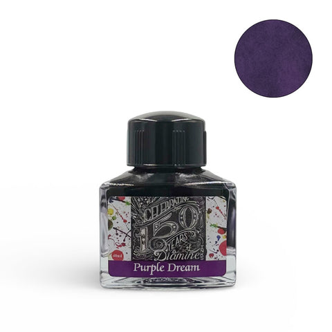 Diamine Purple Dream (150th Anniversary) fountain pen ink, 40ml glass bottle with triangular design, featuring a black screw-on cap and purple swatch.