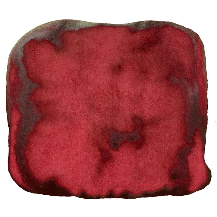Abstract deep red pigment wash resembling a watercolor ink blot, representing Robert Oster's Red Candy - 2ml fountain pen ink sample.