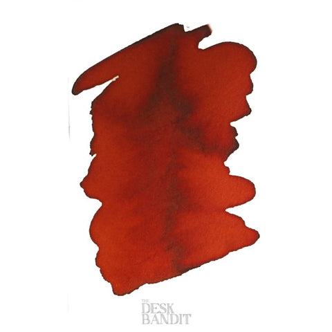 Red Orange - 2ml ink sample, featuring an abstract red-orange splash on white. The Desk Bandit watermark subtly appears at the bottom.