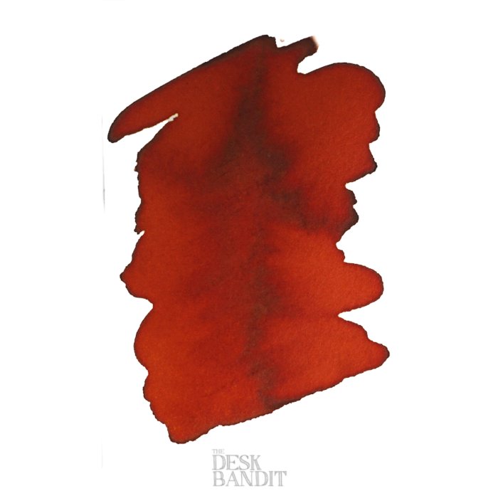 Red Orange - 50ml ink swatch by Robert Oster, featuring a vibrant reddish-orange splash on white, symbolizing sustainable and high-performance fountain pen ink.