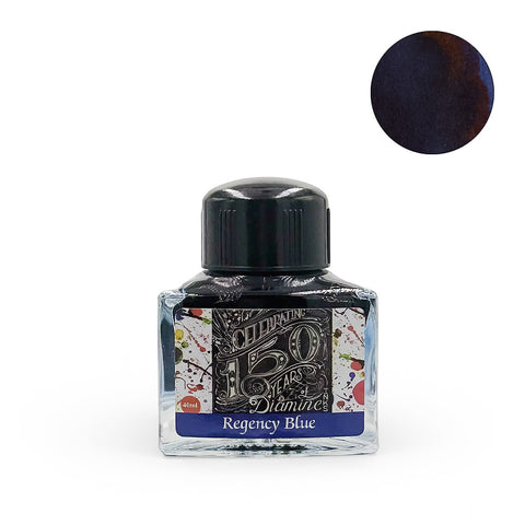 Diamine Regency Blue (150th Anniversary) fountain pen ink, 40ml triangular glass bottle, with deep blue ink swatch showing reddish-brown shading. Ideal for vintage pens, acid-free, vegan.