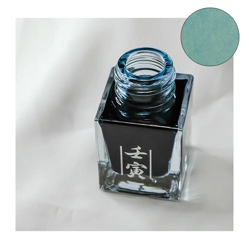 Renyin 2022 (Tiger) 20ml fountain pen ink by Fanyantan in a square glass bottle, showcasing teal hue with Chinese characters on the label.