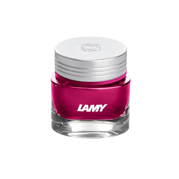 Lamy T53 Crystal Ink - Rhodonite - 30ml, a glass bottle with bright magenta-pink fountain-pen ink, topped by a silver screw-on cap, made in Germany.