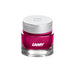 Lamy T53 Crystal Ink - Rhodonite - 30ml, a glass bottle with bright magenta-pink fountain-pen ink, topped by a silver screw-on cap, made in Germany.