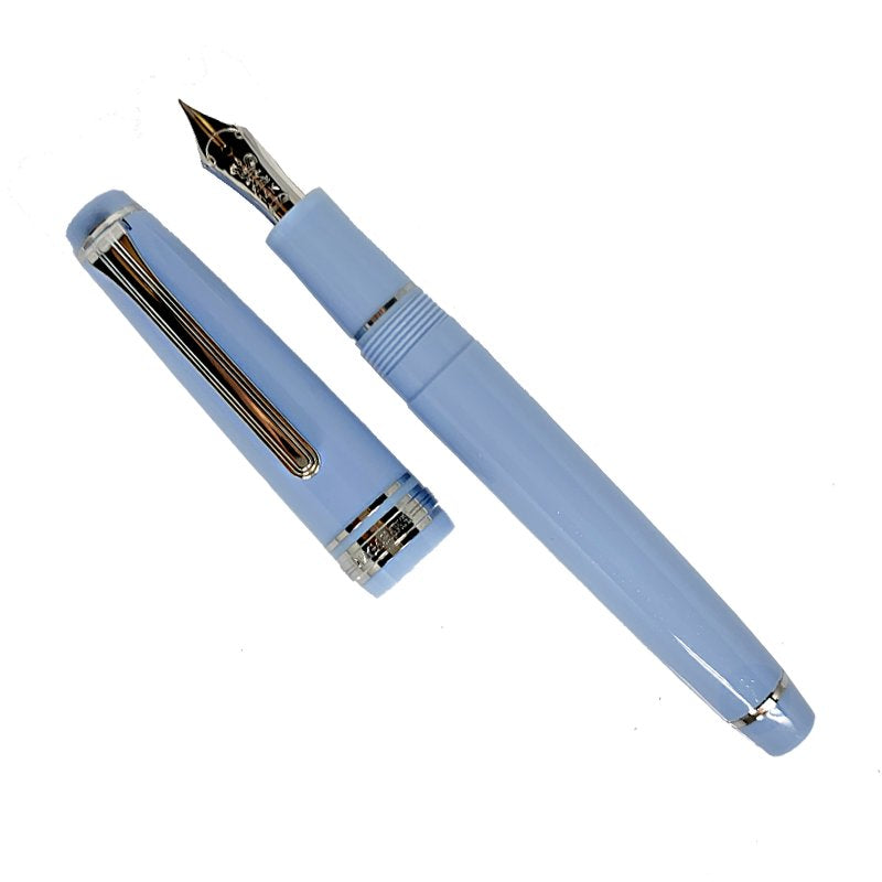 Nagasawa Original Pro Gear Slim - Rokko Island Sky - Fine pen with polished metal nib, silver-tone trim, and matching cap, showcasing exquisite craftsmanship.