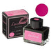 Taccia Rose Pale (Lip Color) - 30ml ink set with a square glass bottle, pink label, black cap, outer carton, and rose-pink color swatch.