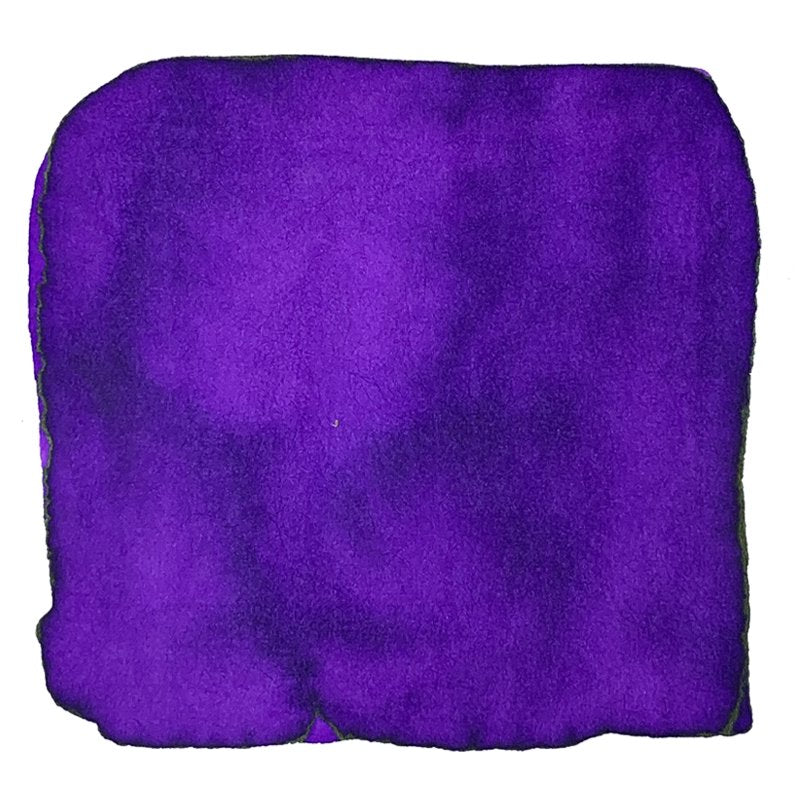 TWSBI 1791 - Royal Purple - 18ml ink bottle beside a square, purple microfiber cloth, symbolizing the ink's vibrant hue and historical inspiration.