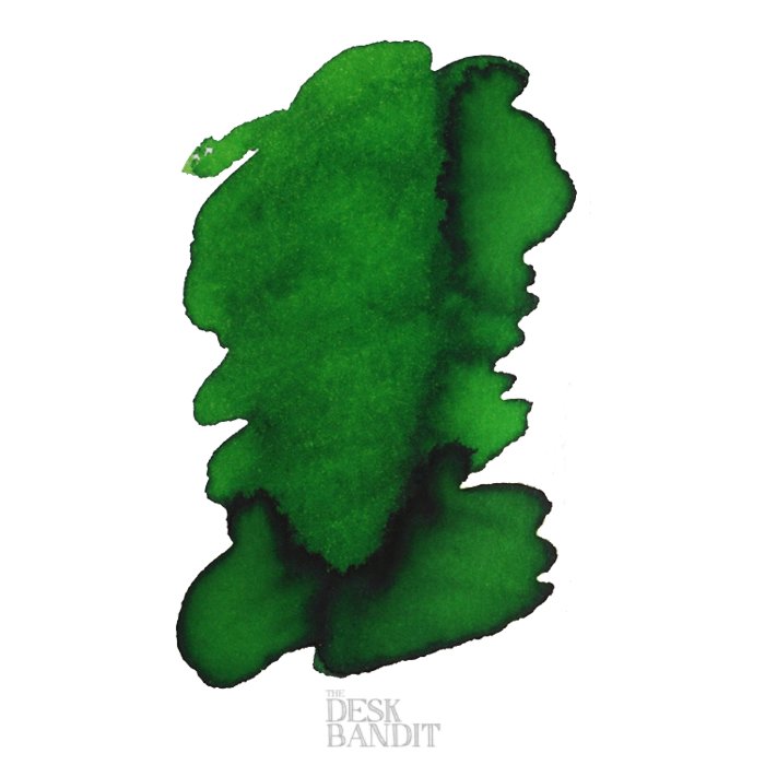 Ryde Green - 2ml ink sample by Robert Oster, featuring an abstract green splash on white, with a faint The Desk Bandit watermark at the bottom.