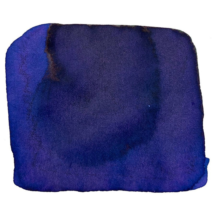 Sailor Ink Studio #543 - 20ml features a hand-painted blue-purple swatch showing uneven saturation and darker pooling, highlighting its unique dye-based composition.