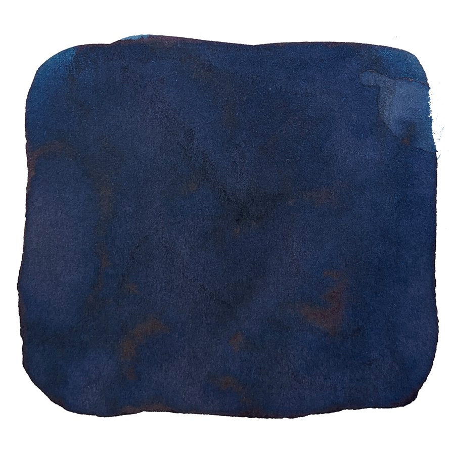 Ink Studio #640 - 20ml: A swatch of deep, dark blue ink with soft, uneven edges and subtle texture, resembling a watercolor sample.