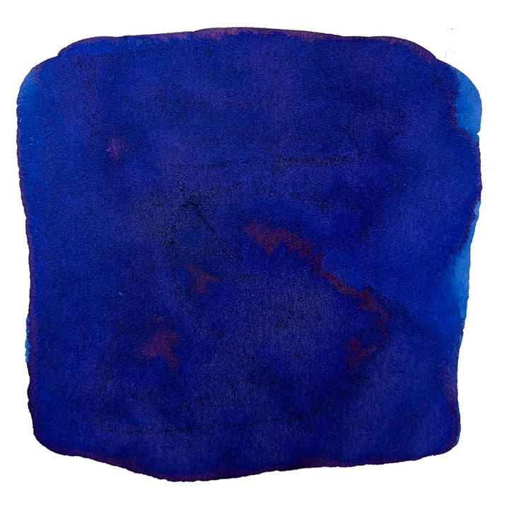 Ink Studio #840 - 2ml features a deep, saturated blue swatch with uneven edges and hints of red-purple sheen, reflecting Sailor's curated ink collection.