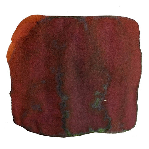 Ink Studio #973 - 2ml swatch, showcasing maroon-red hues with burgundy depth and greenish sheen, illustrating Sailor's dye-based ink properties.