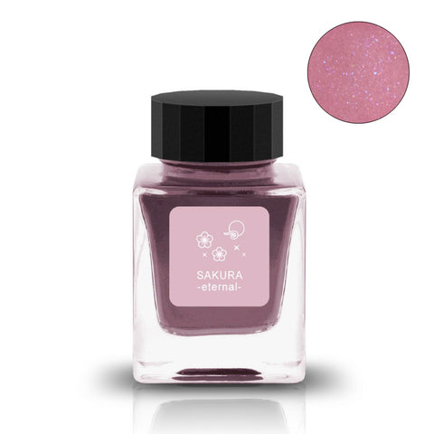 Square glass bottle of Sakura -Eternal- (Shimmer) ink, displaying a pink-mauve, sparkly finish, part of Tono & Lims' 'Flower Memories' series.
